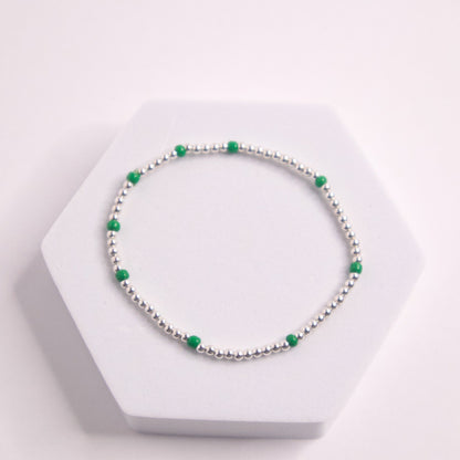 Sterling silver beaded bracelet with green seed beads