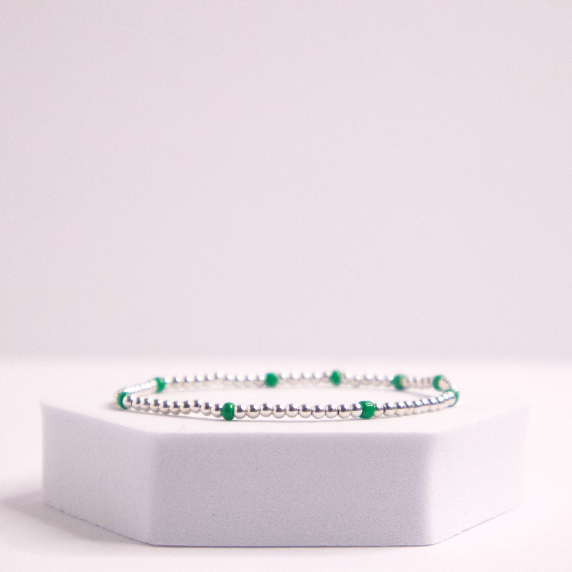 Sterling silver beaded bracelet with green seed beads